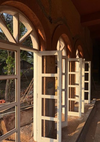 beautiful arc windows for sustainable luxury villa